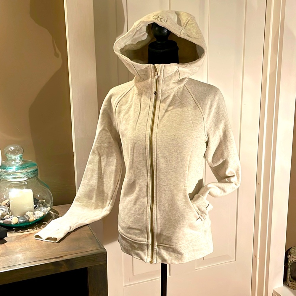 Lulu hoodie zip. Cream color. Very warm. Logos on the hood and zipper